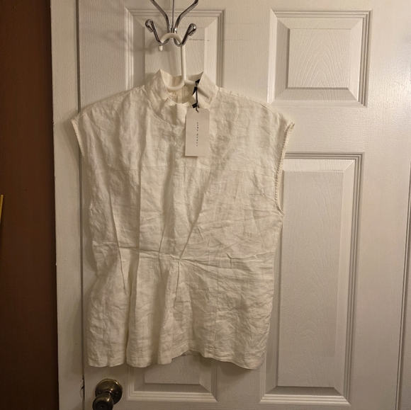 Elegant White Sleeveless Top - Picture 5 of 7